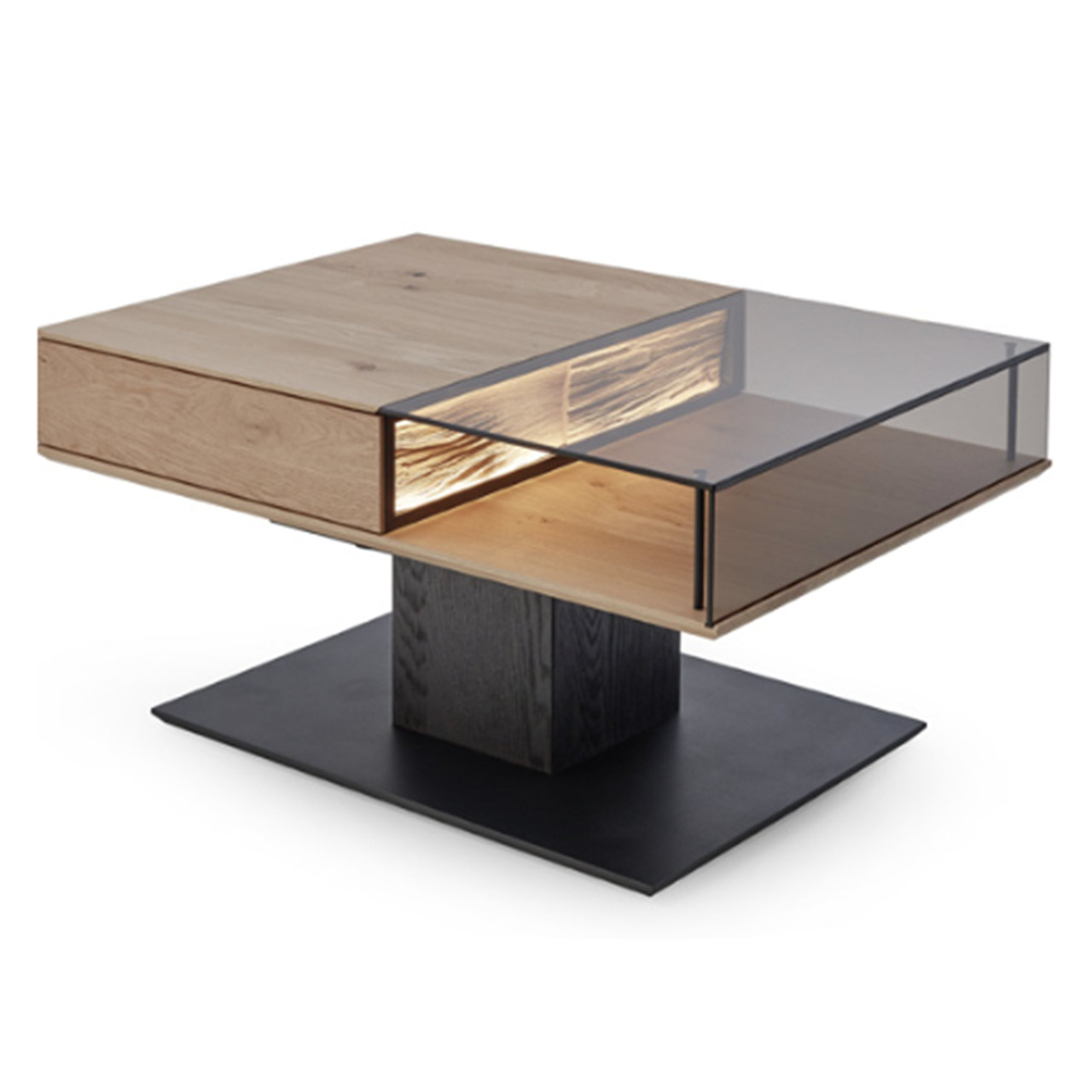 Moderner rechteckiger Couchtisch aus massiver Kerneiche mit Spaltholz-Applikation. Tischplatte zweigeteilt in Glas und Holz. Mit Ablagefläche unter Glas und Schubkasten unter Holz. Säule und Bodenplatte eckig in Holz anthrazit.