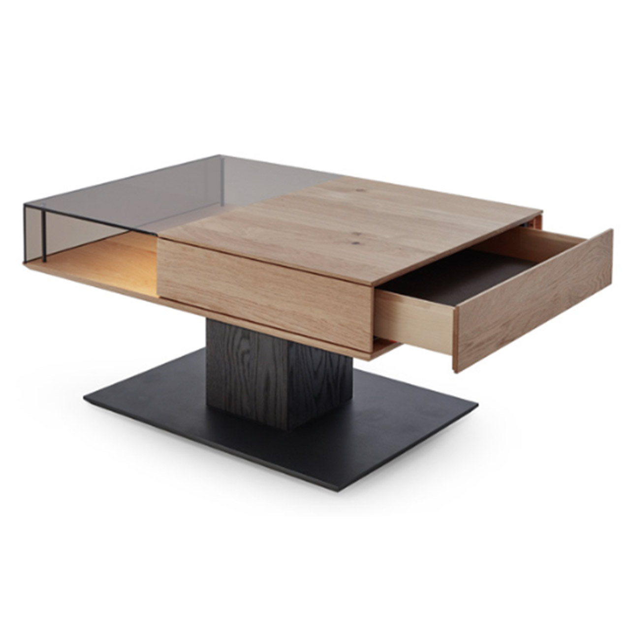 Moderner rechteckiger Couchtisch aus massiver Kerneiche. Tischplatte zweigeteilt in Glas und Holz. Mit Ablagefläche unter Glas und offenem Schubkasten unter Holz. Säule und Bodenplatte eckig in Holz anthrazit.